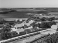 3. Vind by, 1962. Holstebrovej med mejeriet midt i billedet. Brombærvej og Bærkær i baggrunden og den nedlagte station yderst til højre.